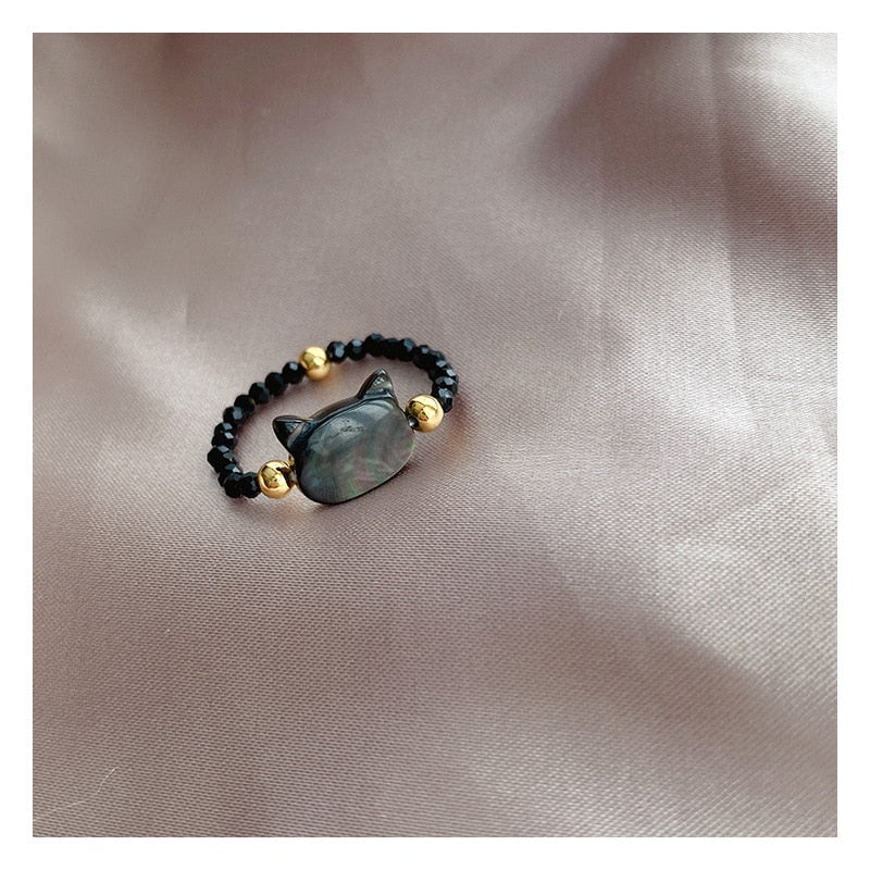 Ring med lyckokattsdesign
