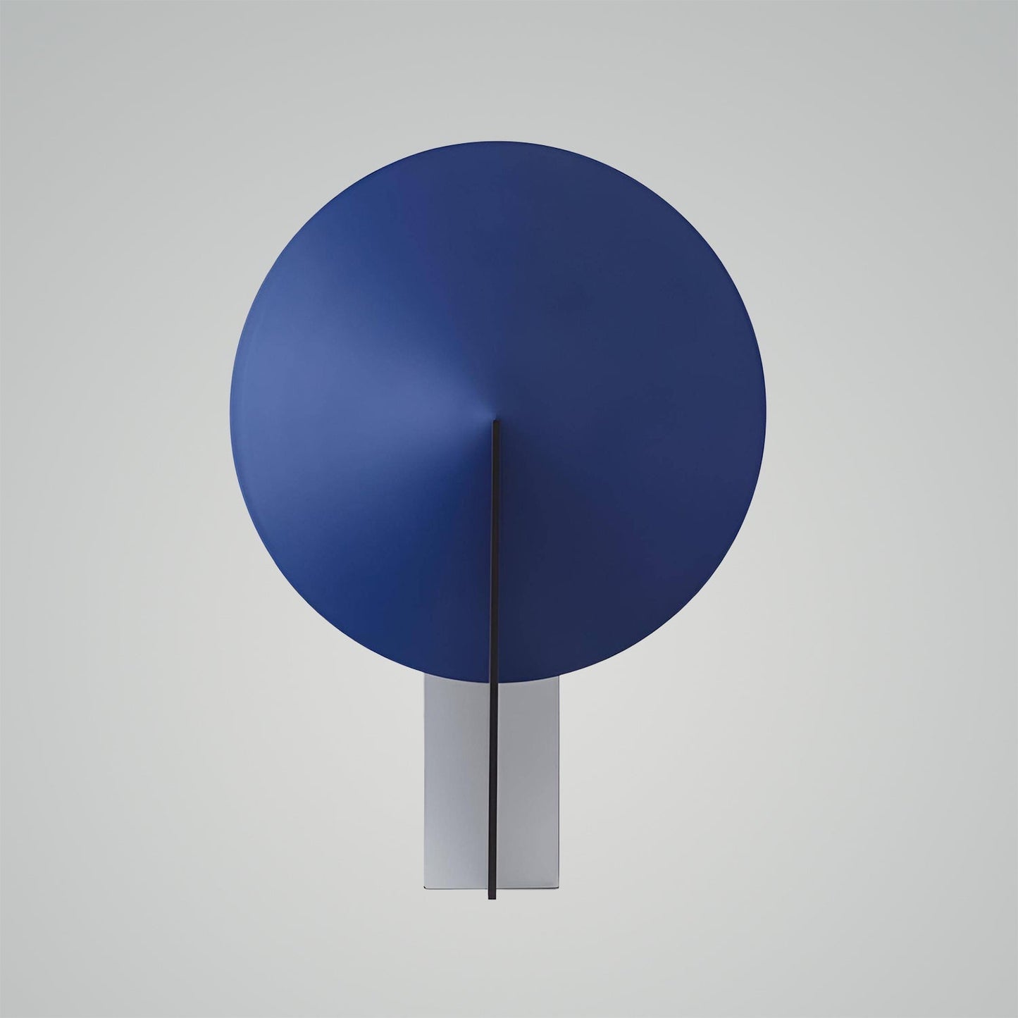 Elegant cirkelformad bordslampa med mjukt, inbjudande sken