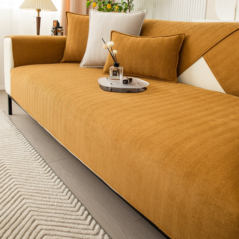 Elegant soffbeskydd i chenille med fiskbensmönster