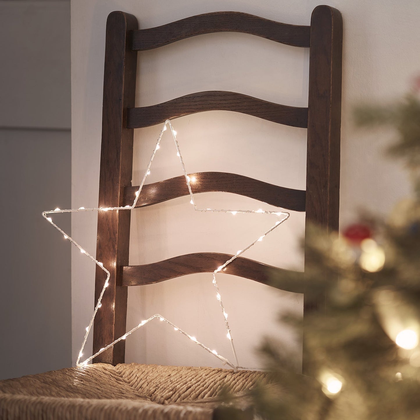 Elegant stjärnfönsterlampa med varmt LED-sken