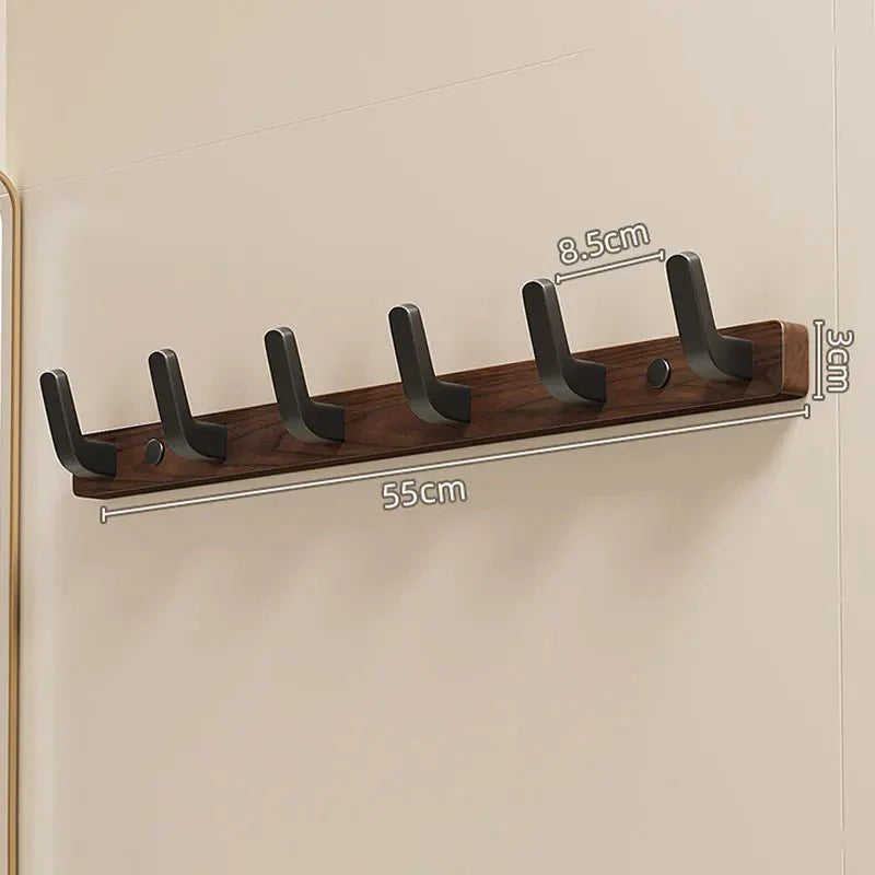 Elegant svart väggkrok i trä - platsbesparande design