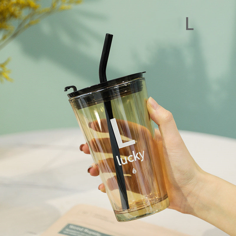 Moderne rejsebecher med låg og sugerør til isvand, kaffe, juice, drikkevarer