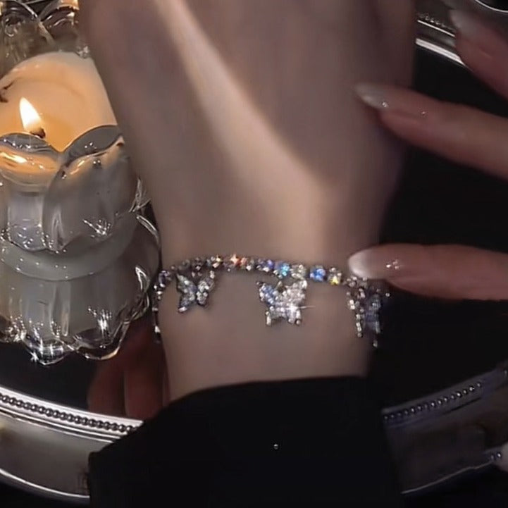 Armbånd med sommerfugledesign