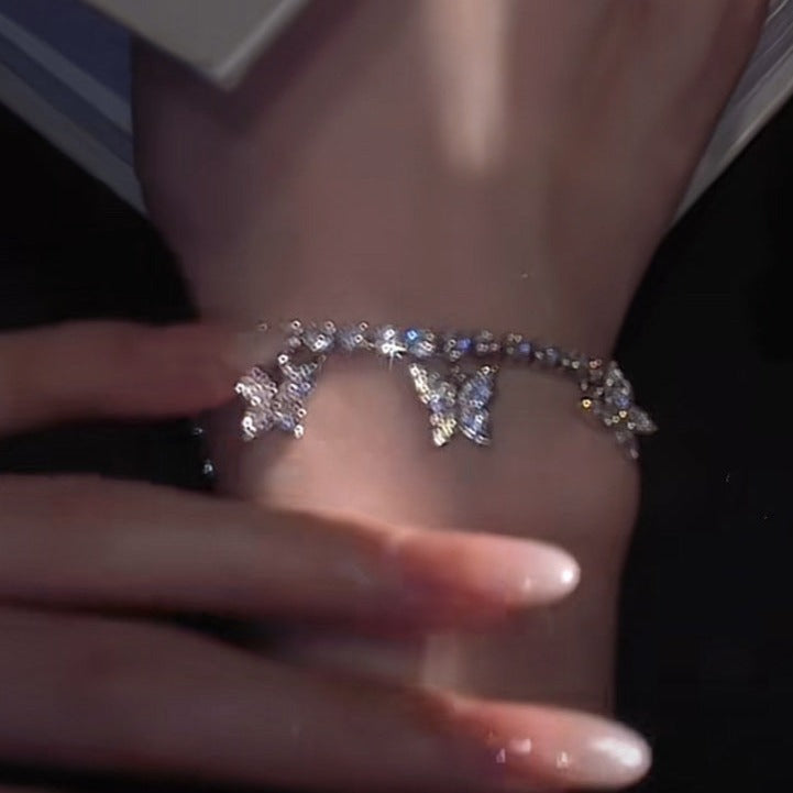 Armbånd med sommerfugledesign
