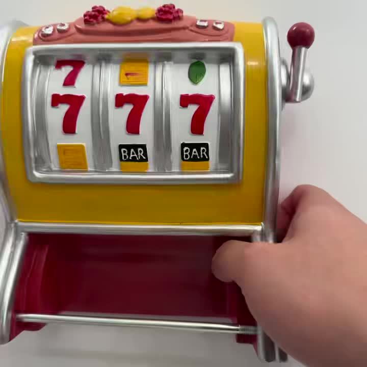 Färgglad väggmonterad toalettpappershållare - Spelmaskinsdesign