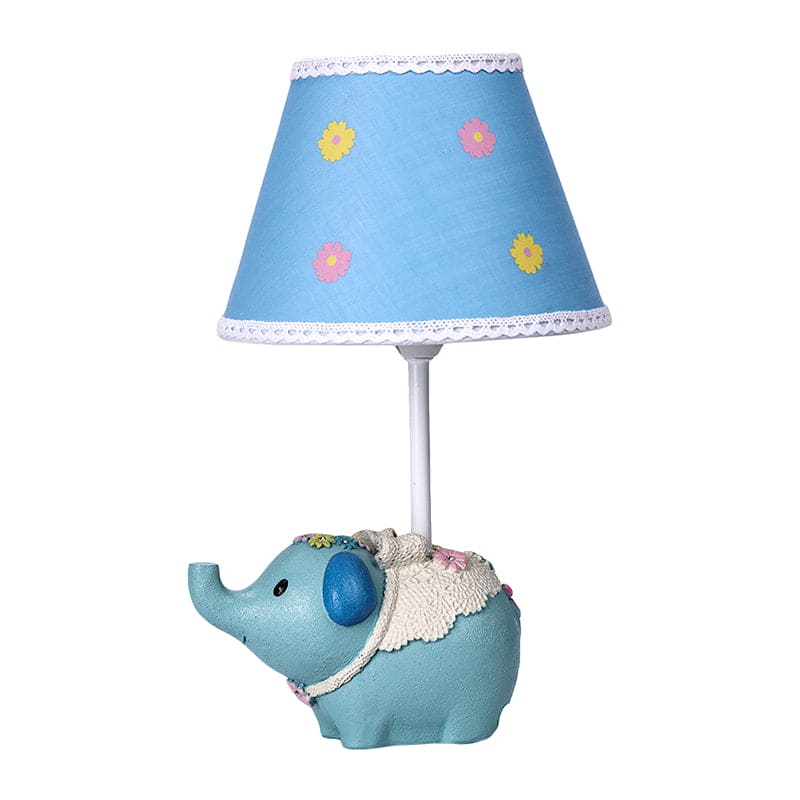 Elegant bordslampa med blommönster och unik elefantbas