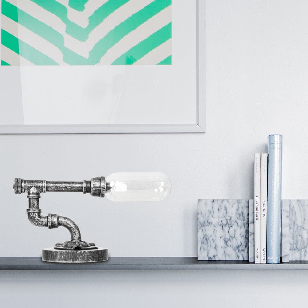 Stilren bordslampa i klart glas med rund skärm