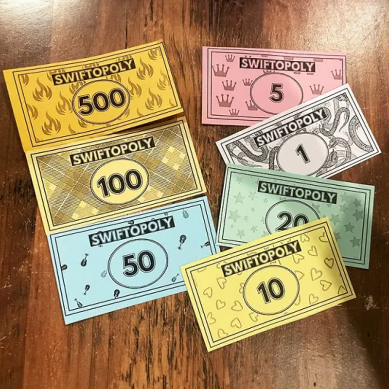 Musikbaseret brætspil med sangkort og Monopoly penge til spilleaftener