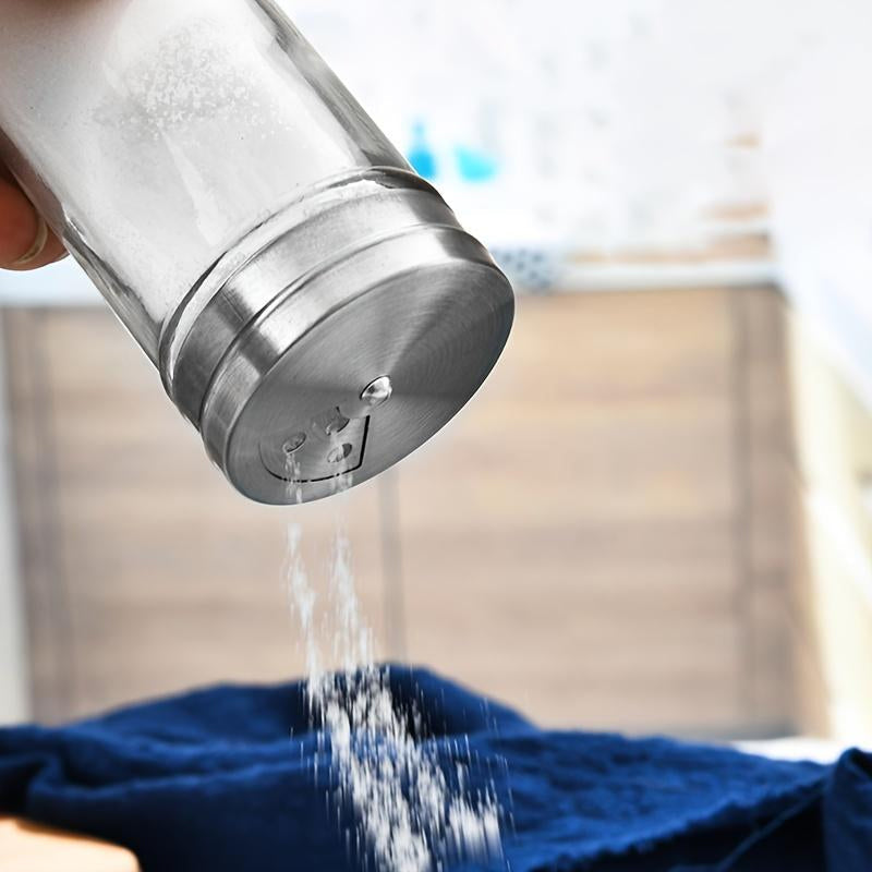 Uppsättning kryddburkar i glas