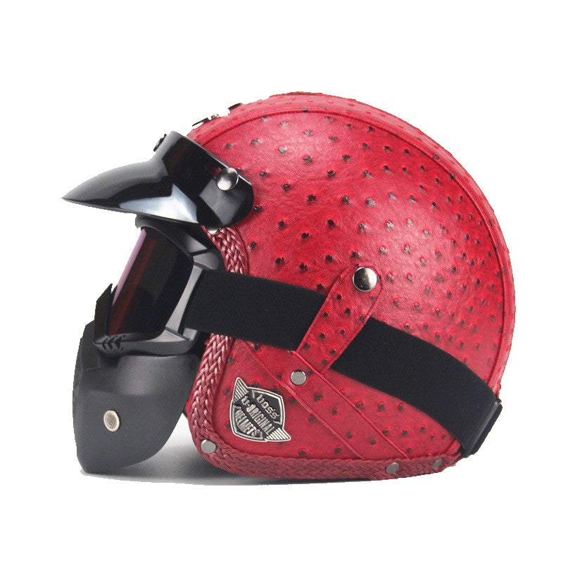 Vintage motorcykelhjälm i konstläder med visir och glasögonmask