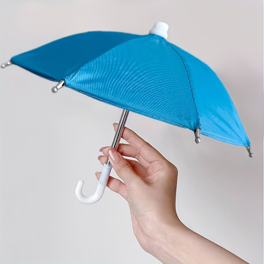 Mini parasol med sugekop – beskyt din mobil mod sol og regn på farten