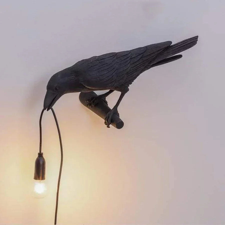 Skulptural belysning i fågelform
