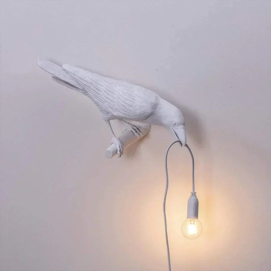 Skulptural belysning i fågelform