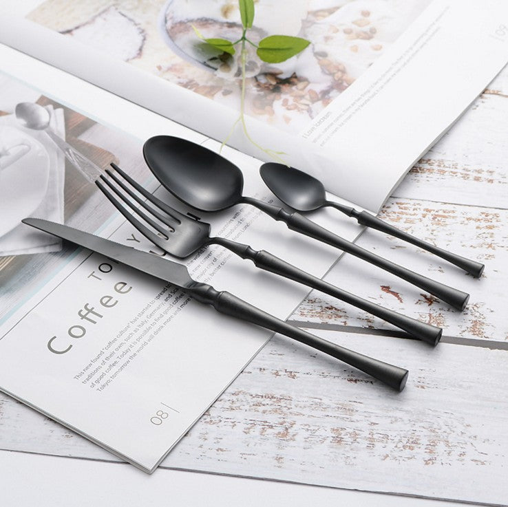 Elegant Bestickset i Rostfritt Stål med Stilfull Design
