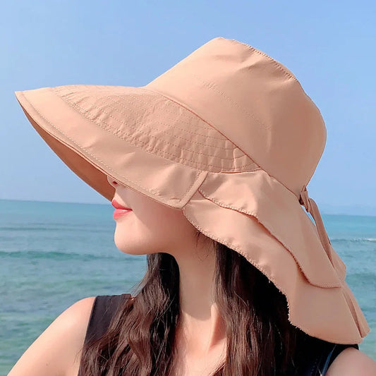Elegant solhatt för kvinnor med UV-skydd och brett brätte