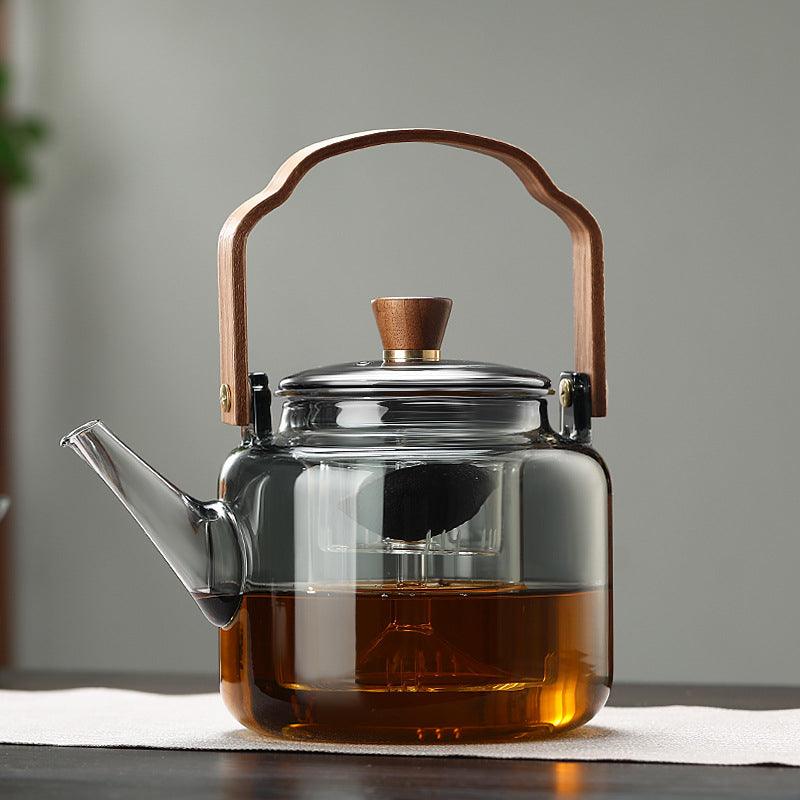 Elegant tekanna i trä och glas - perfekt för teentusiaster