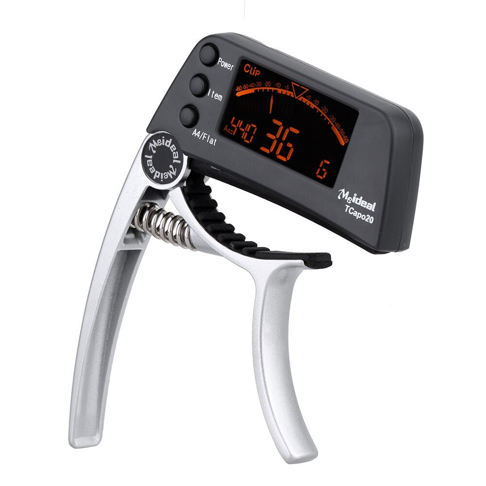 Kombineret Capo og Tuner – StrengFix
