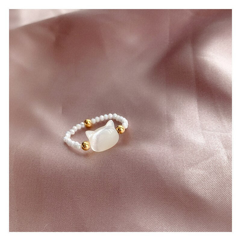 Ring med lyckokattsdesign