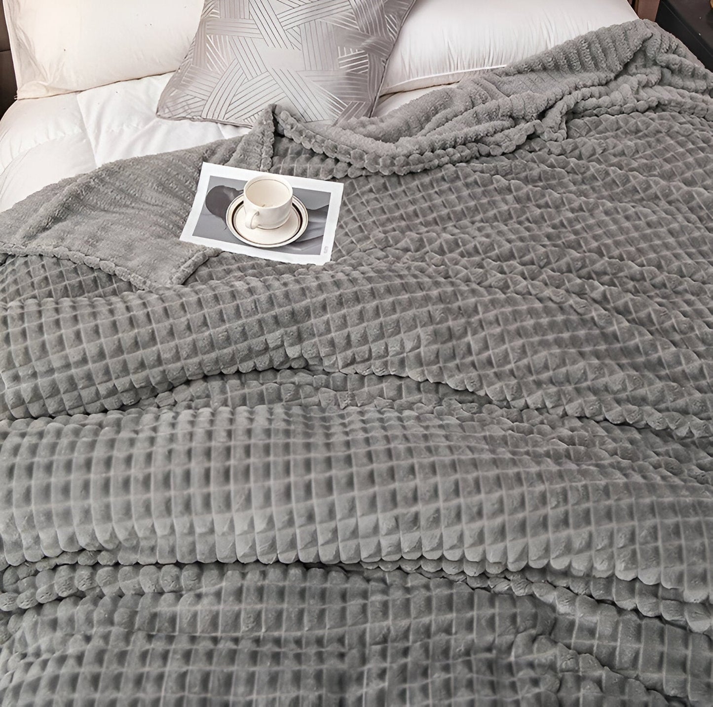 Ultrafluffy koralfarvet fleece-tæppe med struktureret plaid design