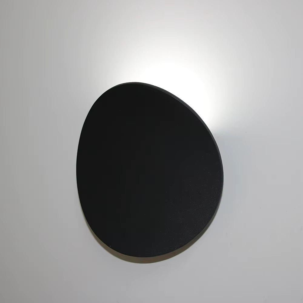 Elegant vägglampa i vågformad design – minimalistisk och modern
