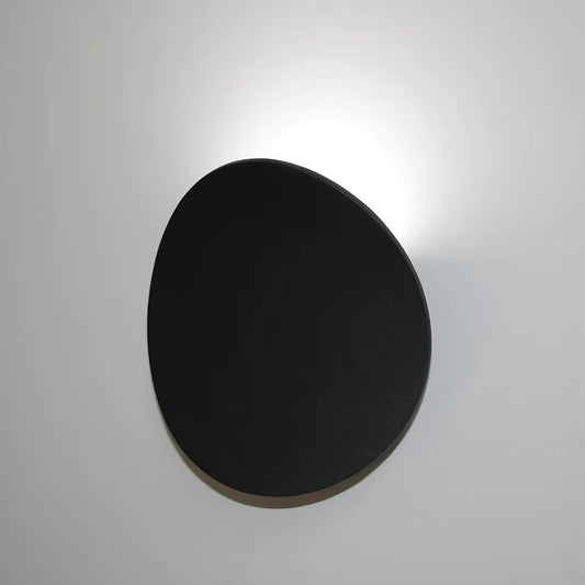 Elegant vägglampa i vågformad design – minimalistisk och modern