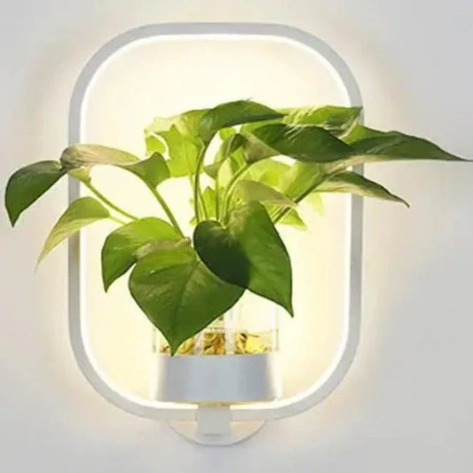 Elegant LED-vägglampa med inbyggd växthållare