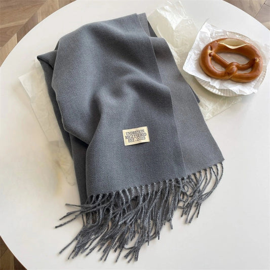 Elegant pashminasjal med dubbel design och tofsar