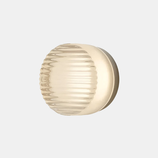 Stilren rund LED-vägglampa: Skulptural och platsbesparande