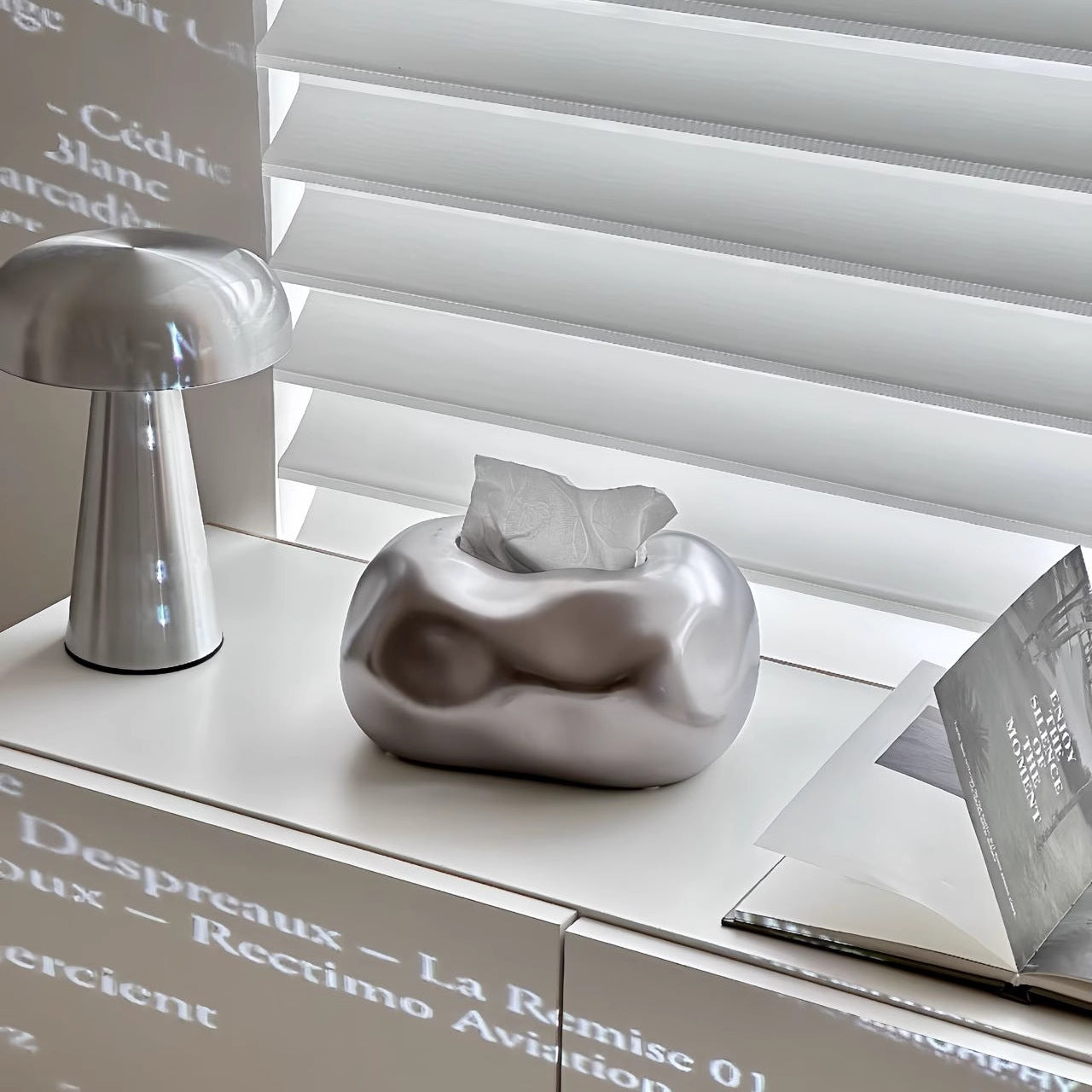 Elegante Kleenex-boks i keramikformet sky-design