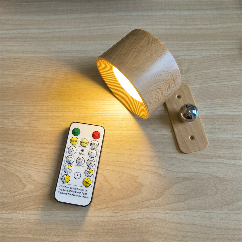 Modern vägglampa med USB-laddning och justerbara ljusinställningar