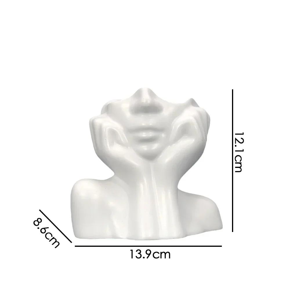 Glad blomkrukkeskulptur