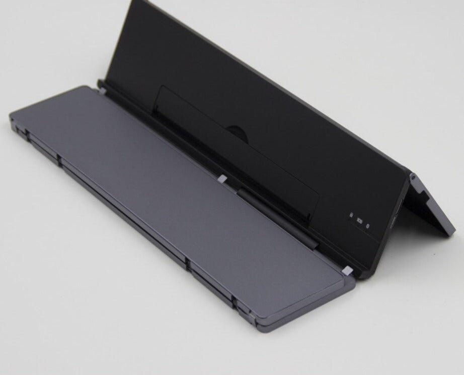 Bærbar trådløs sammenfoldelig tablet-holder tastatur