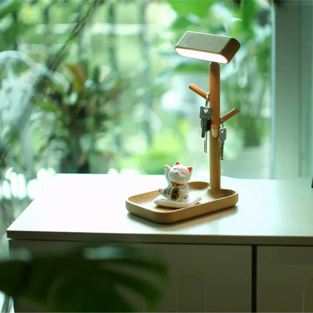 Elegant dæmpbar bordlampe med opbevaringsplads