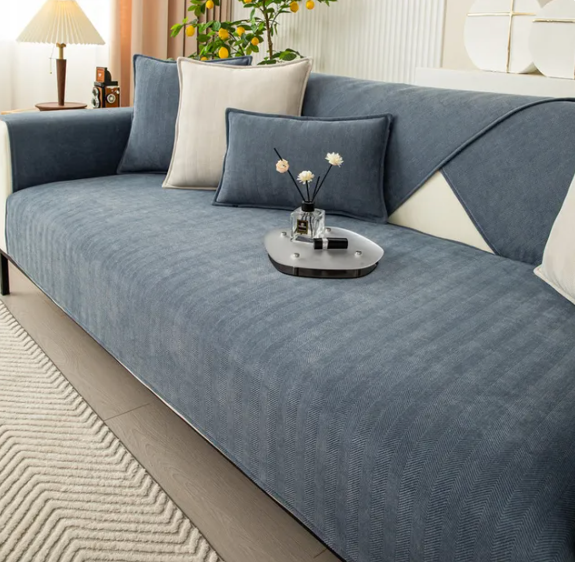 Elegant soffbeskydd i chenille med fiskbensmönster