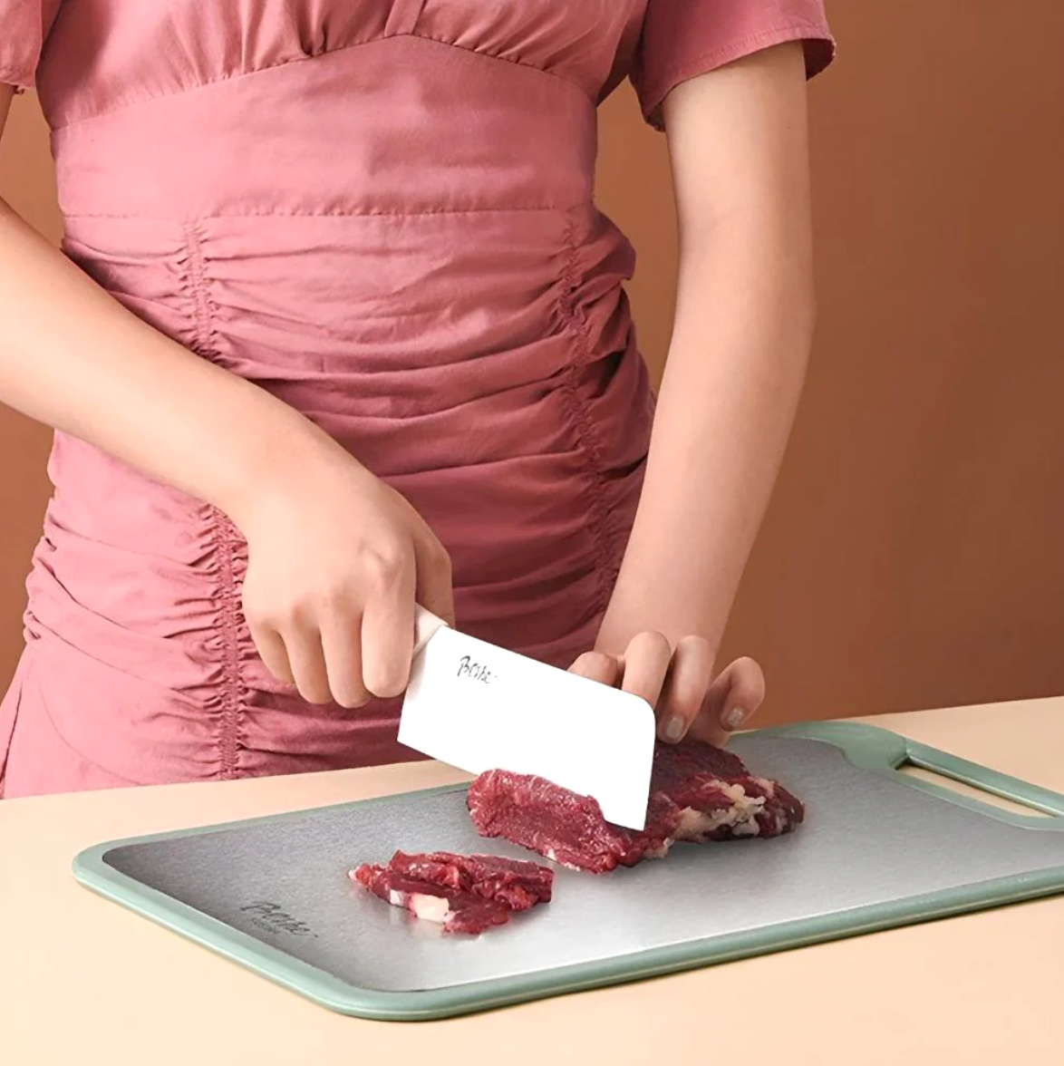 Hygienisk skärbräda i rostfritt stål med vitlökspress