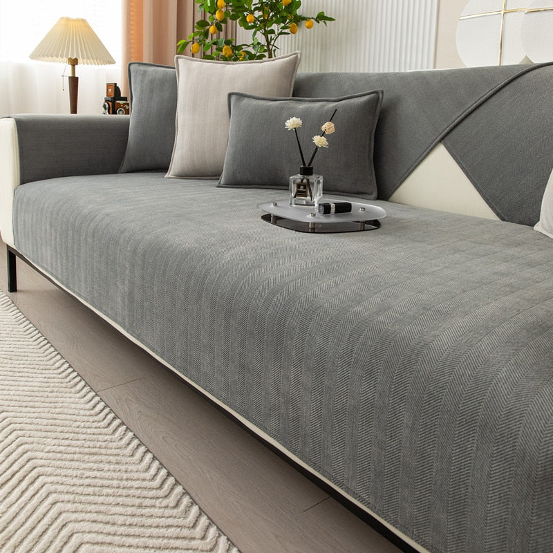 Elegant soffbeskydd i chenille med fiskbensmönster