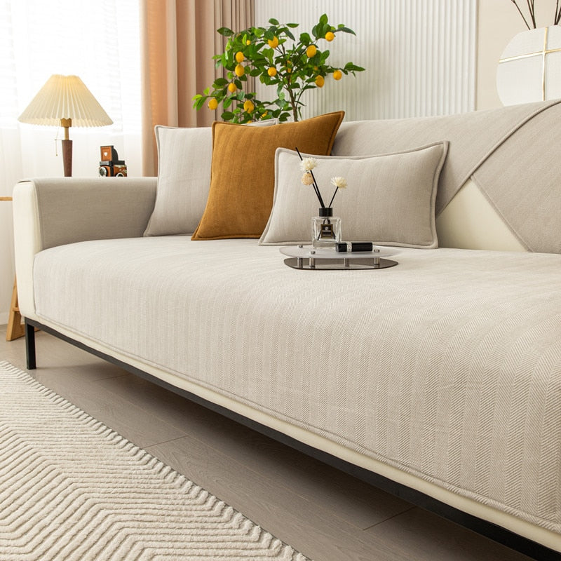 Elegant soffbeskydd i chenille med fiskbensmönster
