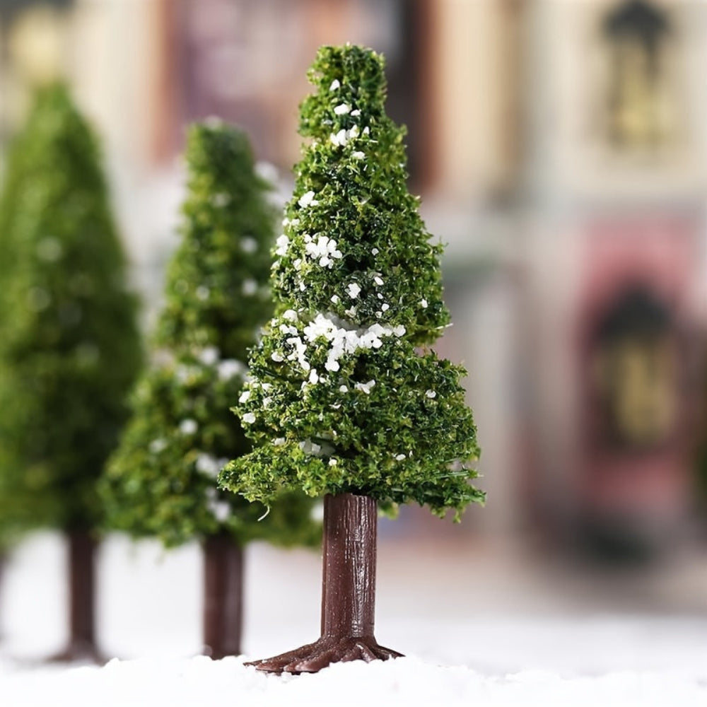 Festlig dekoration med lille juletræ til borddisplay