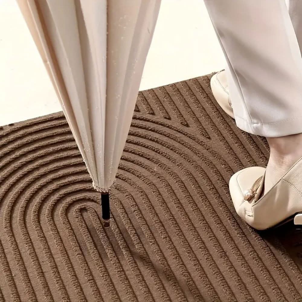 Elegant och Absorberande Dörrmatta med Modern Kurvdesign