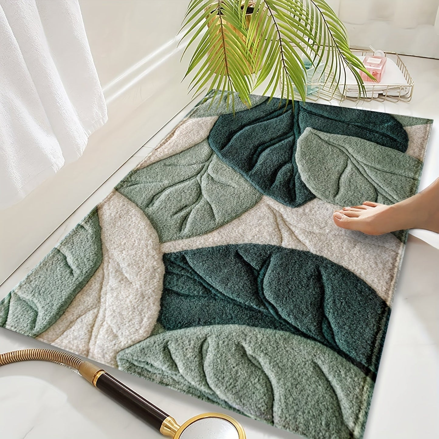 Mjuk och absorberande badrumsmatta med bladdesign