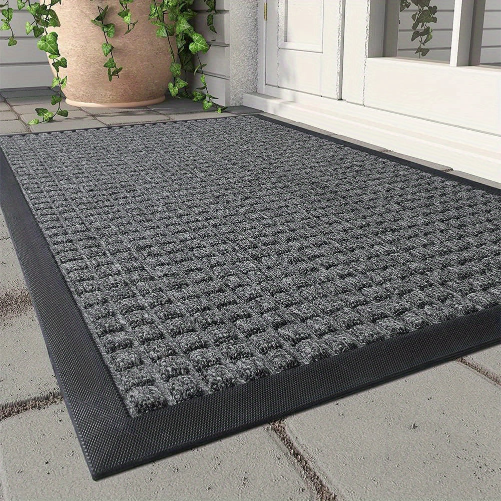 Elegant dörrmatta med gallerdesign för en välvårdad entré