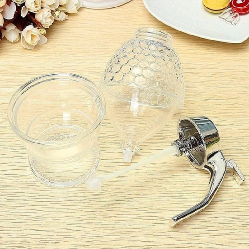 Elegant honungsdispenser med droppfri teknologi – AmberDrop