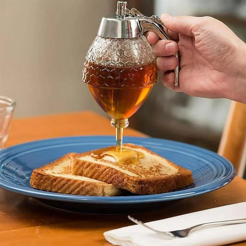 Elegant honungsdispenser med droppfri teknologi – AmberDrop