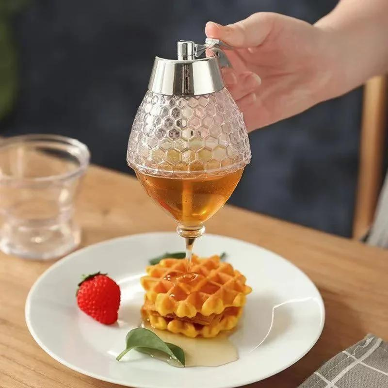 Elegant honungsdispenser med droppfri teknologi – AmberDrop