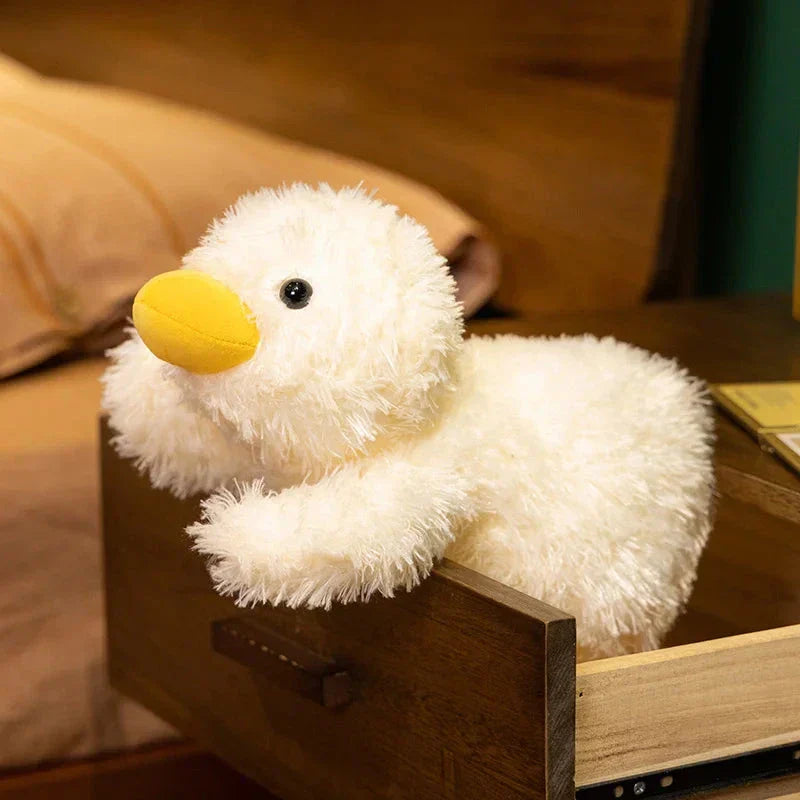 Sødt og blødt babydyr i form af en and i plys