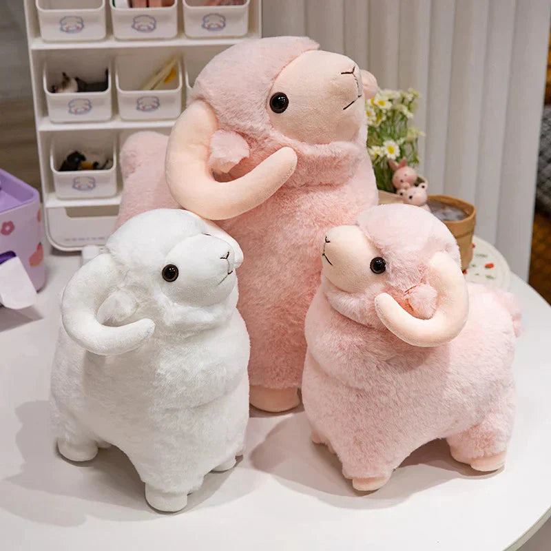 Fluffigt rosa-vitt får mjukisdjur