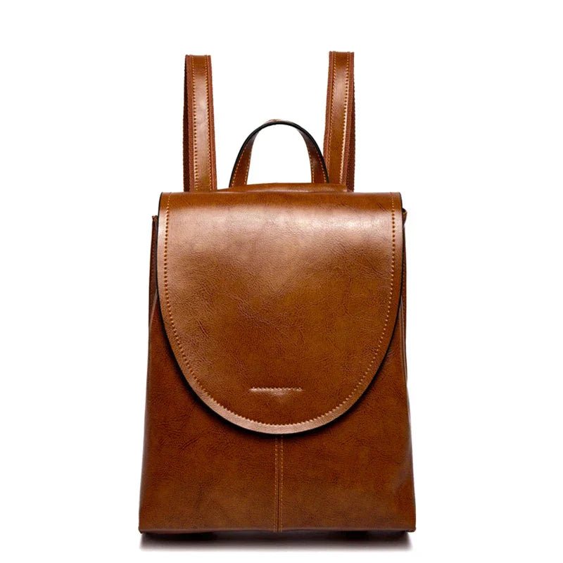 Elegant damryggsäck i läder med justerbara remmar och rymlig design