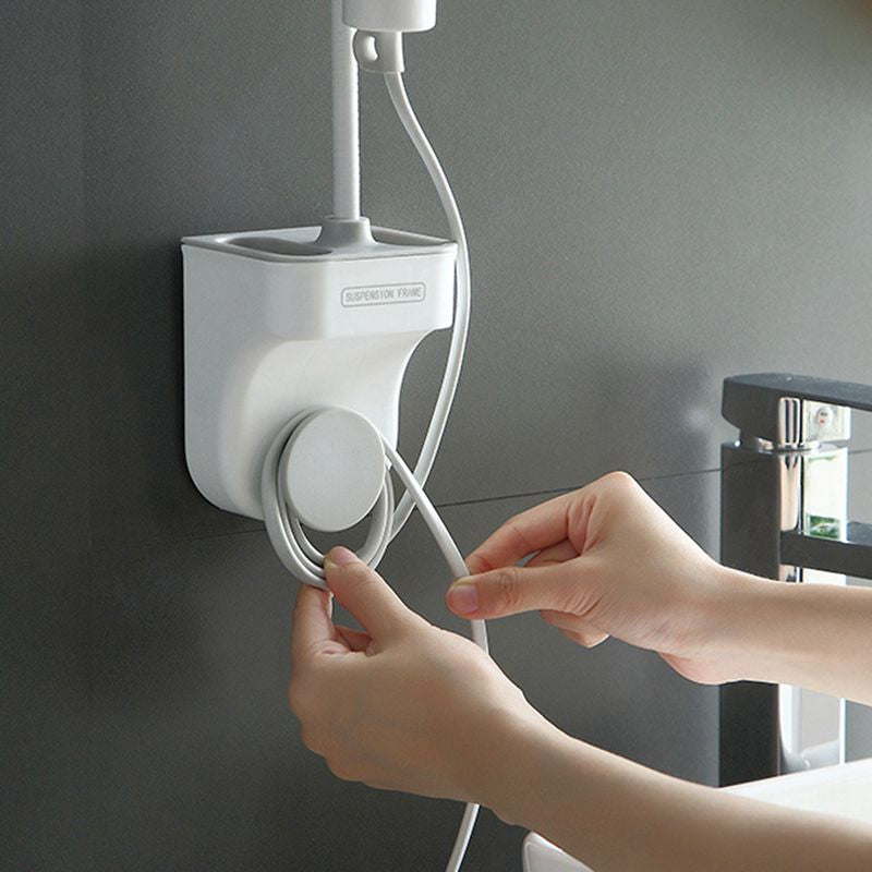Vægbeslået roterbar brusehovedholder