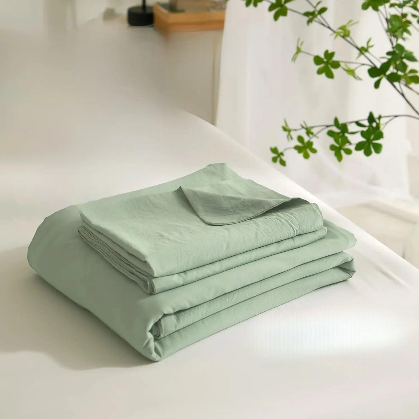 Stilrent, andningsbart bäddset i ljusgrön polyester